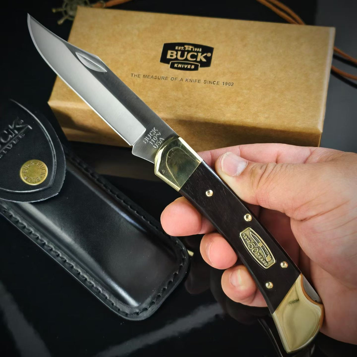 BUCK 110 50th Anniversary Commemorative Edition – Ebony Wood Handle Folding Knife